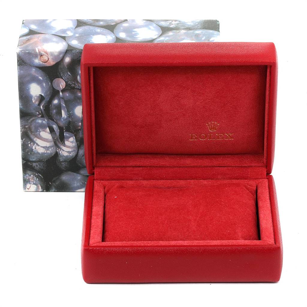 This image shows an empty red Rolex watch box for the Yacht-Master model.