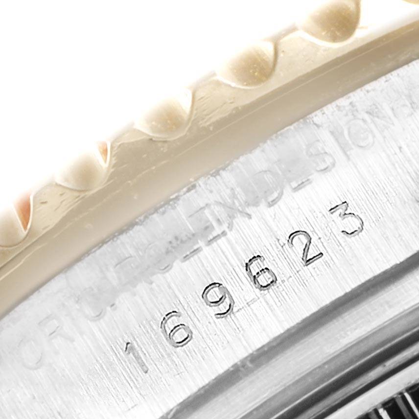 This close-up image shows the bezel and serial number of the Rolex Yacht-Master 169623 Women's Steel and Gold (two tone) Mother of Pearl Dial 169623 Women's Steel and Gold (two tone) Mother of Pearl Dial watch.