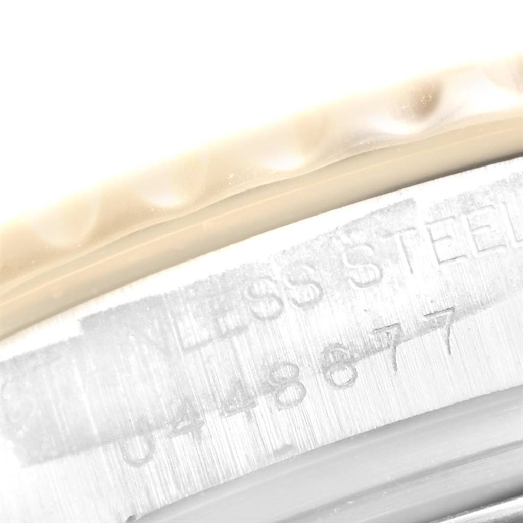 Close-up of the caseback and edge detailing, showing a serial number on the Rolex Yacht-Master 69623 Women's Steel and Gold (two tone) Grey Dial 69623 Women's Steel and Gold (two tone) Grey Dial watch.
