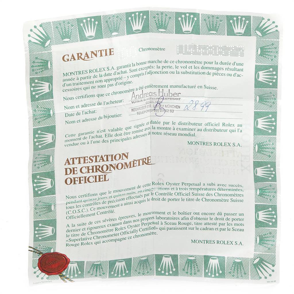 This is a close-up image of the official warranty document for a Rolex Yacht-Master 69623 Women's Steel and Gold (two tone) Grey Dial 69623 Women's Steel and Gold (two tone) Grey Dial watch.