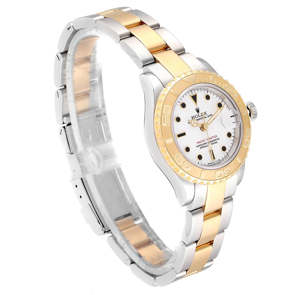 This image shows a side-angle view of the Rolex Yacht-Master 69623 Women's Steel and Gold (two tone) White Dial 69623 Women's Steel and Gold (two tone) White Dial watch, highlighting its gold and silver metal strap and bezel.