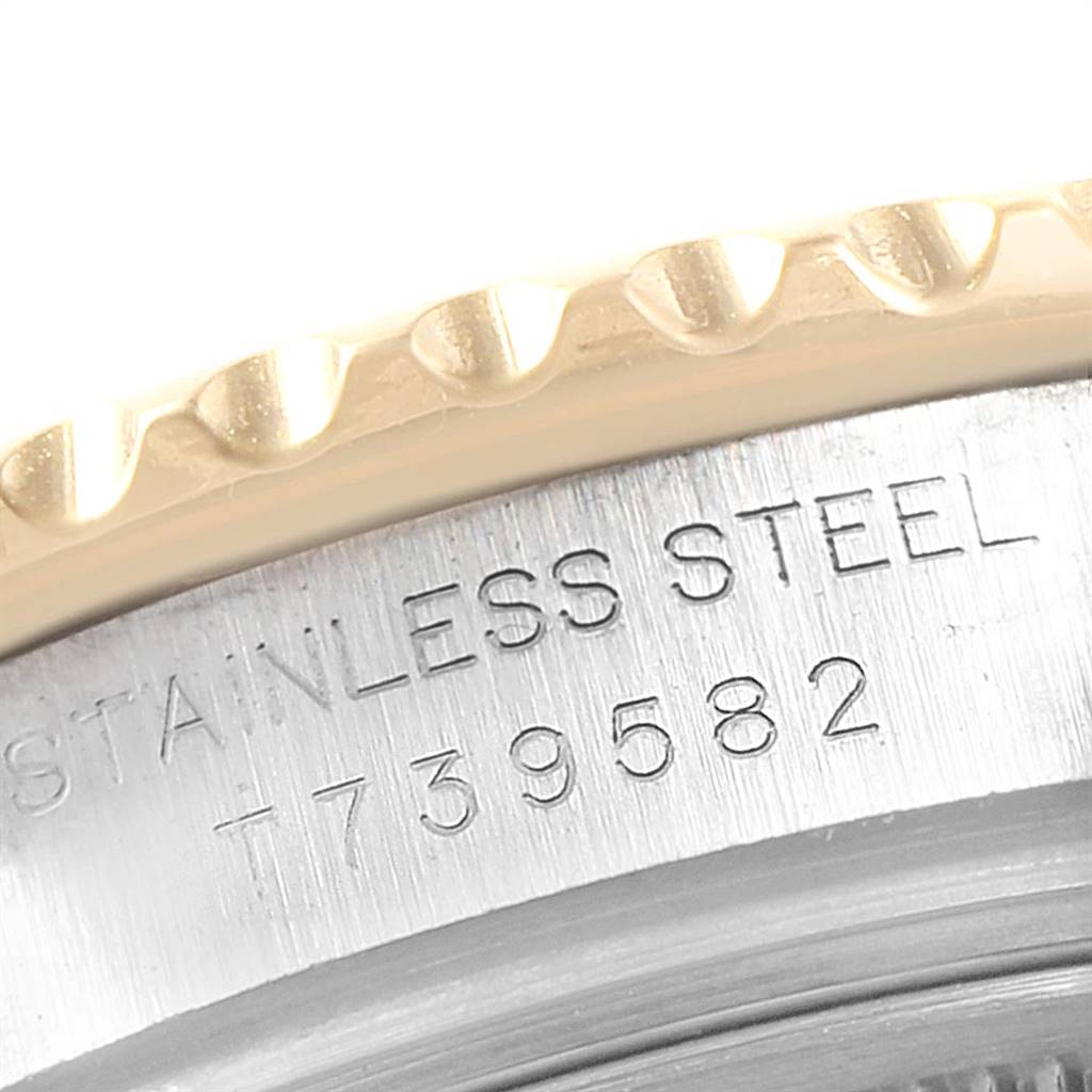 The image shows a close-up of the casing and bezel part of a Rolex Yacht-Master 69623 Women's Steel and Gold (two tone) White Dial 69623 Women's Steel and Gold (two tone) White Dial watch.