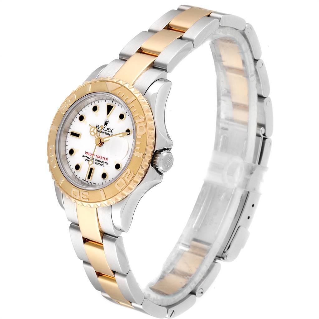 The Rolex Yacht-Master 69623 Women's Steel and Gold (two tone) White Dial 69623 Women's Steel and Gold (two tone) White Dial watch is shown at a three-quarter angle, displaying its face and bicolor metal bracelet.