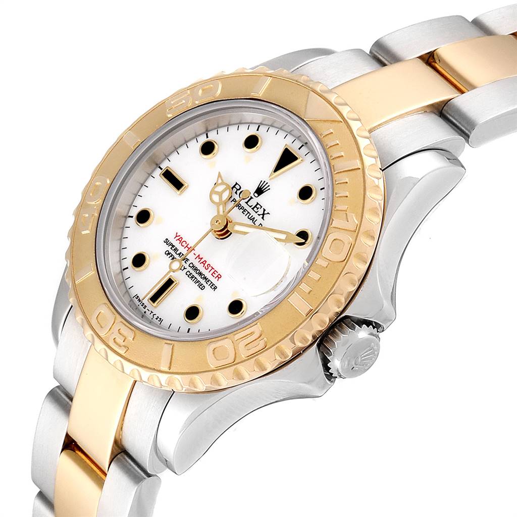 The image shows a Rolex Yacht-Master 69623 Women's Steel and Gold (two tone) White Dial 69623 Women's Steel and Gold (two tone) White Dial watch at an angled side view, highlighting the bezel, dial, and part of the bracelet.