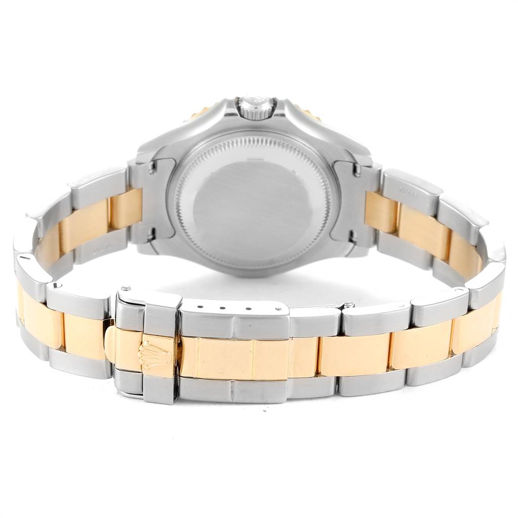 The image shows the back view of a Rolex Yacht-Master 69623 Women's Steel and Gold (two tone) White Dial 69623 Women's Steel and Gold (two tone) White Dial, highlighting the case back and two-tone metal bracelet.