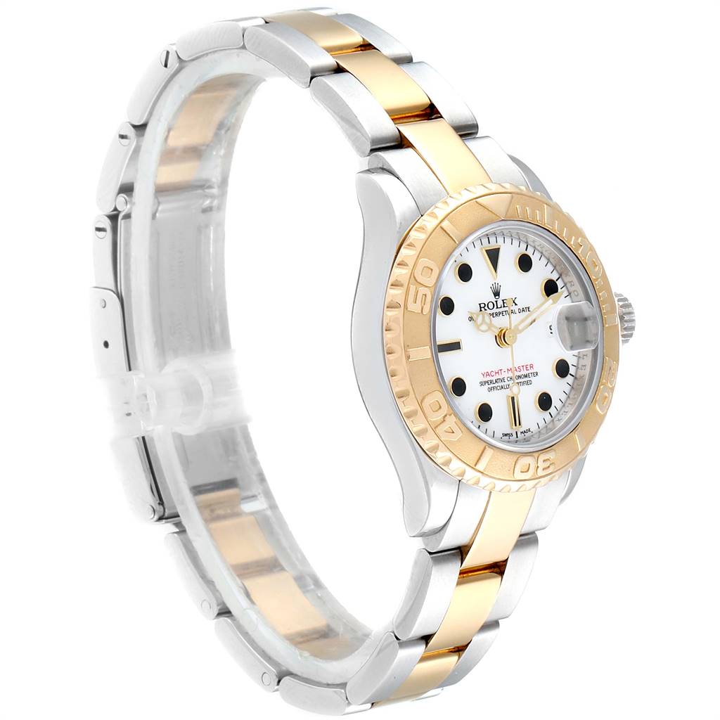 The image shows a side angle of the two-tone Rolex Yacht-Master 69623 Women
s Steel and Gold (two tone) White Dial 69623 Women
s Steel and Gold (two tone) White Dial watch, highlighting its bracelet, bezel, and dial.