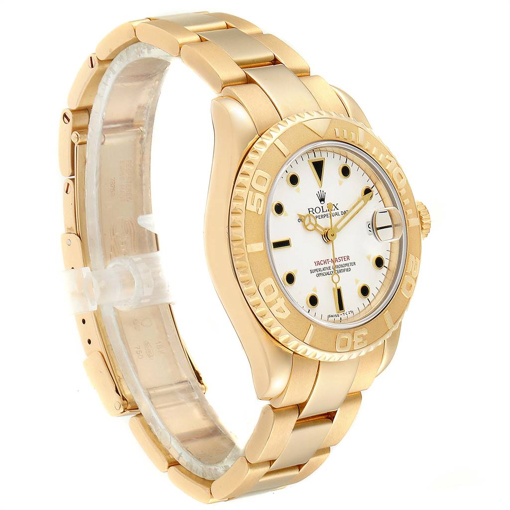 The image shows a side angle of the Rolex Yacht-Master 68628 Yellow Gold White Dial 68628 Yellow Gold White Dial watch highlighting its gold bracelet, bezel, and white dial.