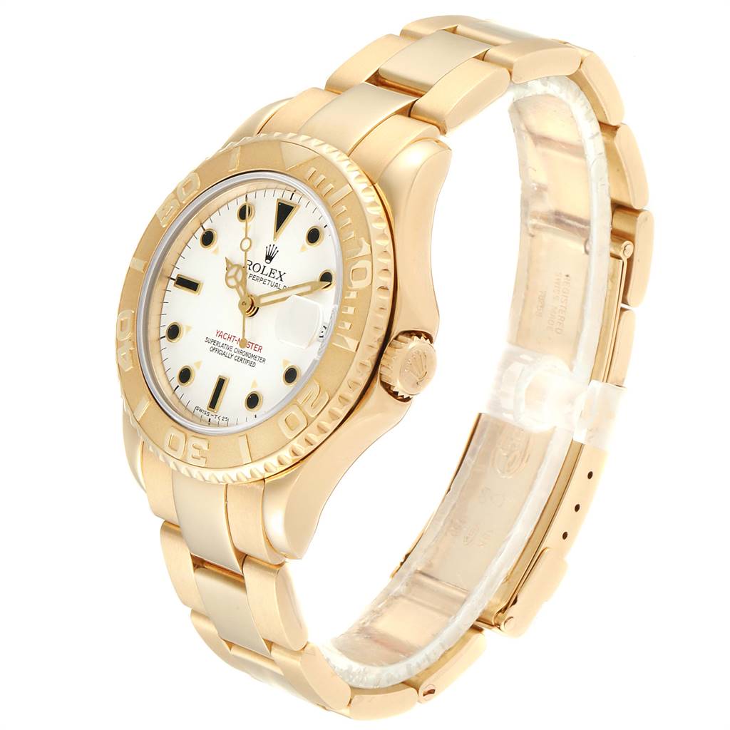 The Rolex Yacht-Master 68628 Yellow Gold White Dial 68628 Yellow Gold White Dial watch is shown at an angled side view, displaying its gold bracelet, case, bezel, and dial.