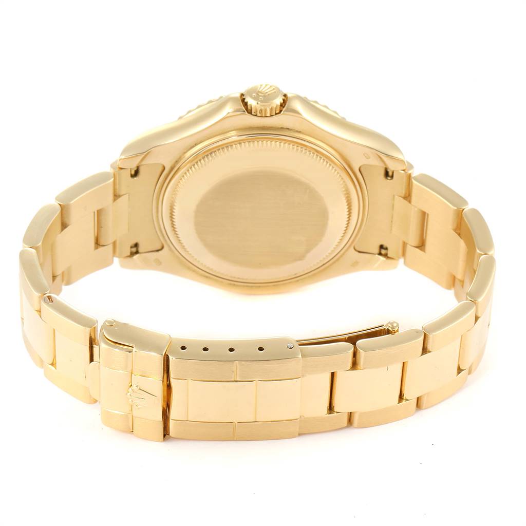 The image shows the back view of a gold Rolex Yacht-Master 68628 Yellow Gold White Dial 68628 Yellow Gold White Dial watch, including the bracelet and clasp.
