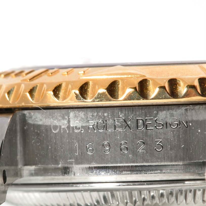 The image shows a close-up side view of the bezel and case of a Rolex Yacht-Master 169623 Women's Stainless Steel Mother of Pearl Dial 169623 Women's Stainless Steel Mother of Pearl Dial watch, featuring the engraved model number 169623.