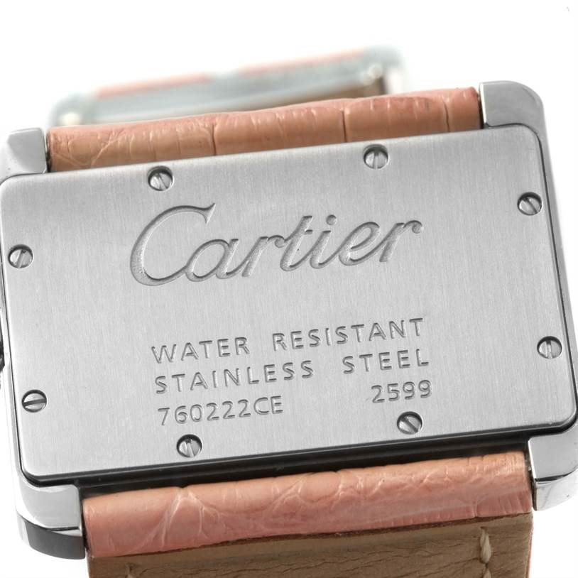 The image shows the back case and part of the leather strap of a Cartier Tank Divan W6301455 Women's Stainless Steel Mother of Pearl Dial W6301455 Women's Stainless Steel Mother of Pearl Dial watch.