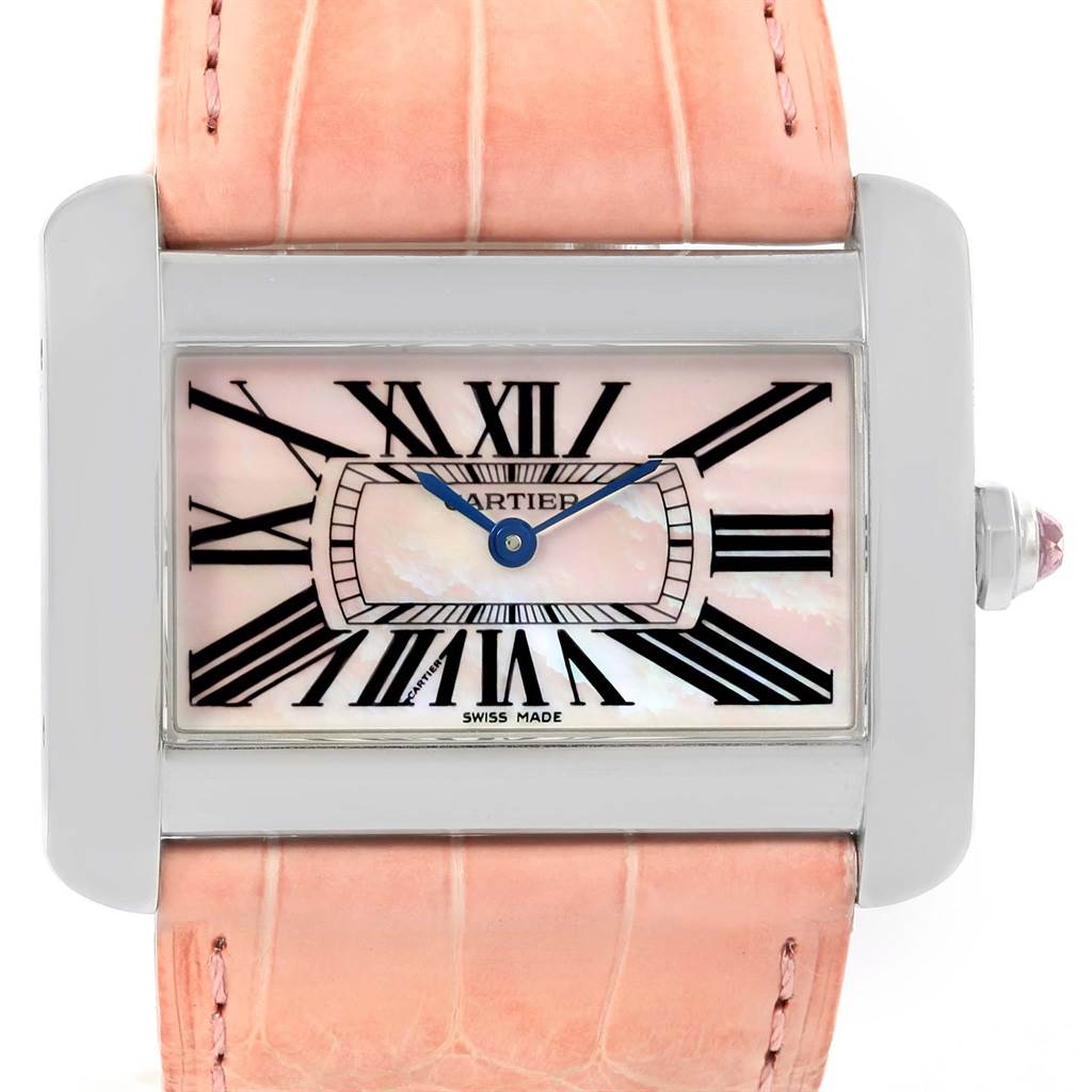 The Cartier Tank Divan W6301455 Women's Stainless Steel Mother of Pearl Dial W6301455 Women's Stainless Steel Mother of Pearl Dial watch is shown from a front angle, displaying its dial, case, and pink leather strap.