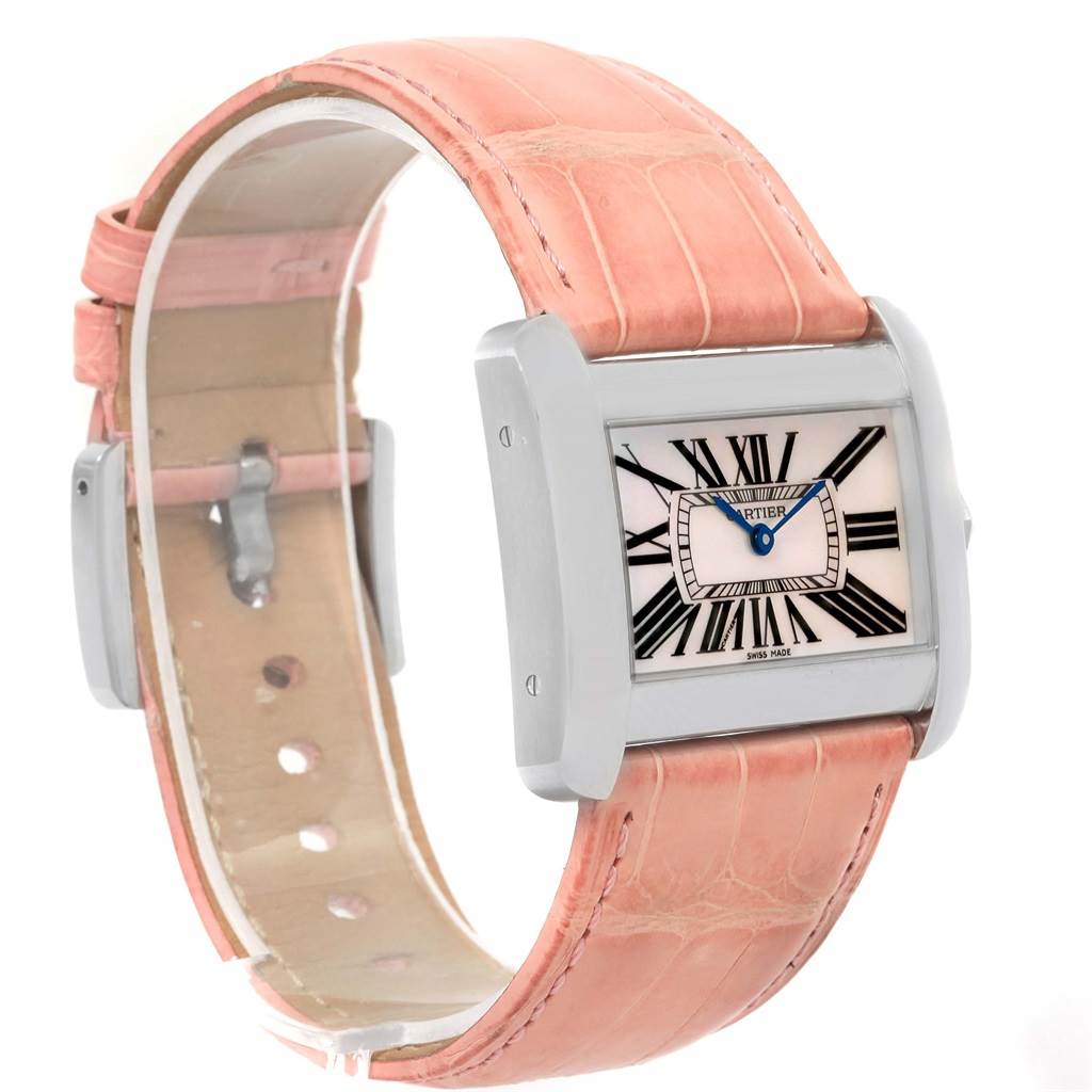 The image shows a Cartier Tank Divan W6301455 Women's Stainless Steel Mother of Pearl Dial W6301455 Women's Stainless Steel Mother of Pearl Dial watch with a pink leather strap and rectangular face featuring Roman numerals.