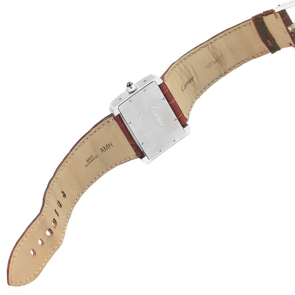 This image shows the back and strap of the Tank Divan watch by Cartier at a slight angle.