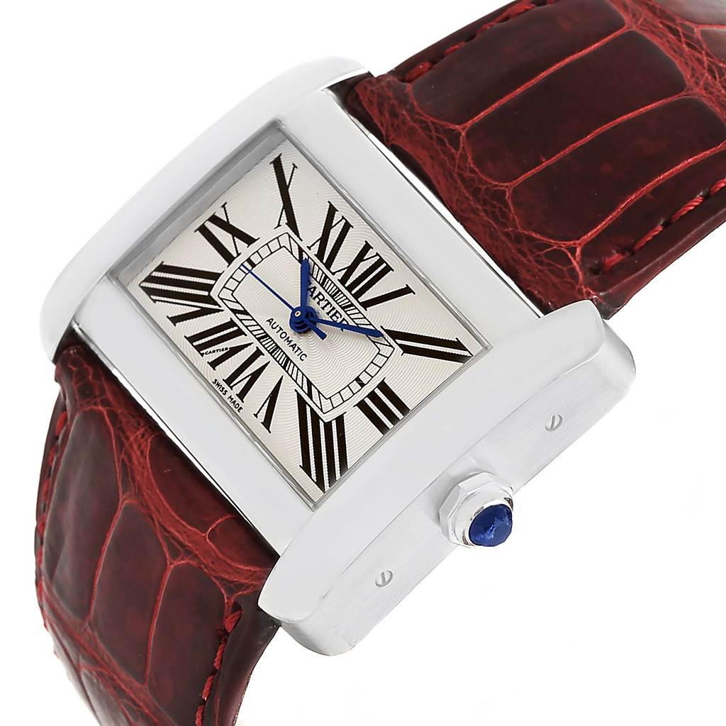 The image shows a close-up angled view of the dial and crown of a Cartier Tank Divan W6300755 Women's Stainless Steel Silver Dial W6300755 Women's Stainless Steel Silver Dial watch with a leather strap.