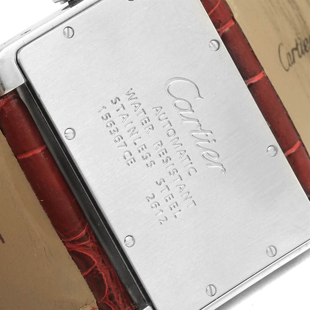 This image shows the case back of the Cartier Tank Divan W6300755 Women's Stainless Steel Silver Dial W6300755 Women's Stainless Steel Silver Dial watch from an angled close-up view, highlighting the engravings and leather strap.