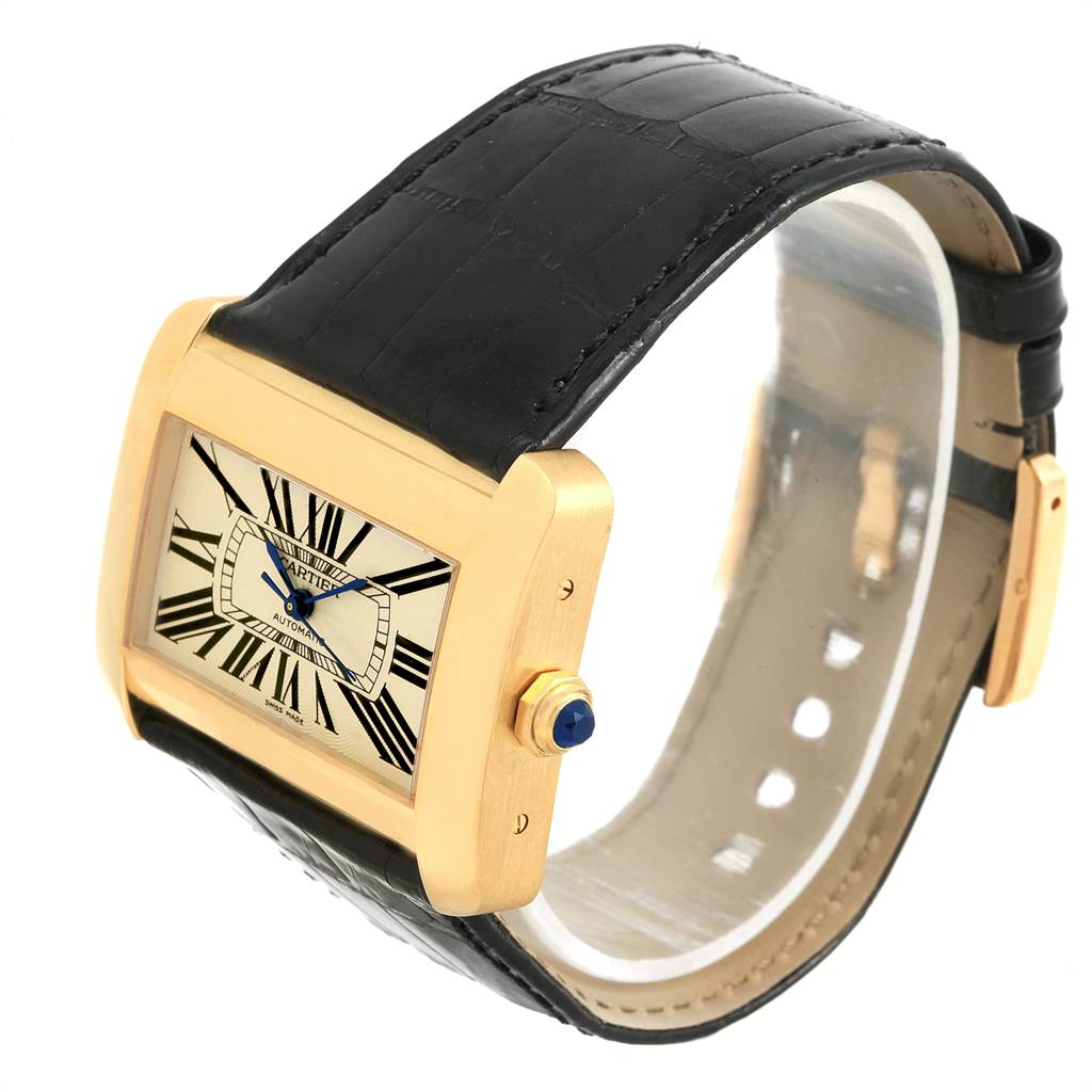 The image shows a Cartier Tank Divan W6300856 Women's Yellow Gold Silver Dial W6300856 Women's Yellow Gold Silver Dial watch, highlighting its rectangular face and black leather strap from an angled side view.