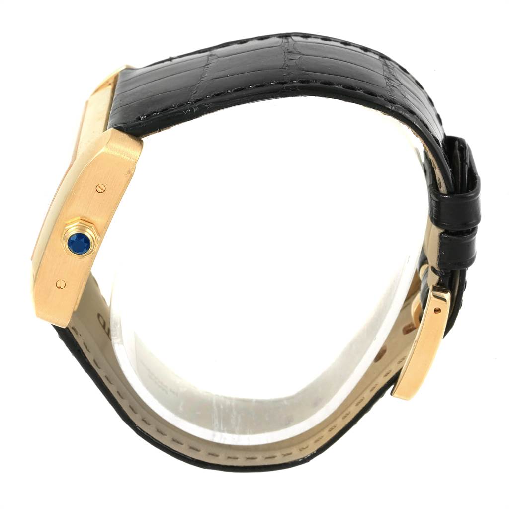 This image shows a side view of the Cartier Tank Divan W6300856 Women's Yellow Gold Silver Dial W6300856 Women's Yellow Gold Silver Dial watch, highlighting the crown, strap, and case.