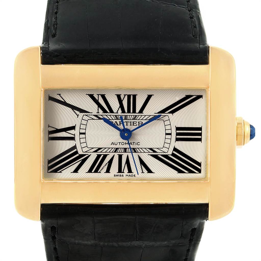 The image shows a front view of the Cartier Tank Divan W6300856 Women's Yellow Gold Silver Dial W6300856 Women's Yellow Gold Silver Dial watch, highlighting its rectangular face, Roman numerals, and black strap.