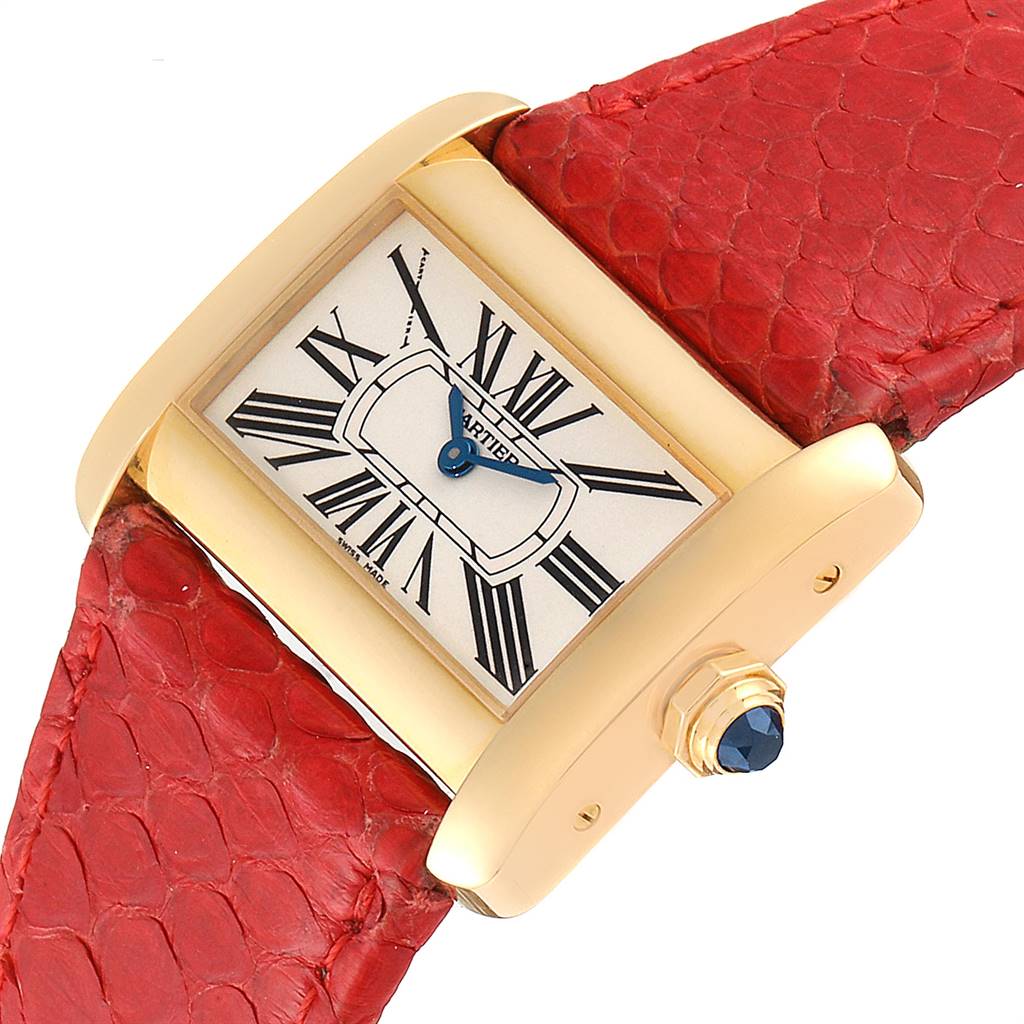 The image shows a Cartier Tank Divan W6300356 Women's Yellow Gold Silver Dial W6300356 Women's Yellow Gold Silver Dial watch at an angled close-up of the face and part of the red strap.