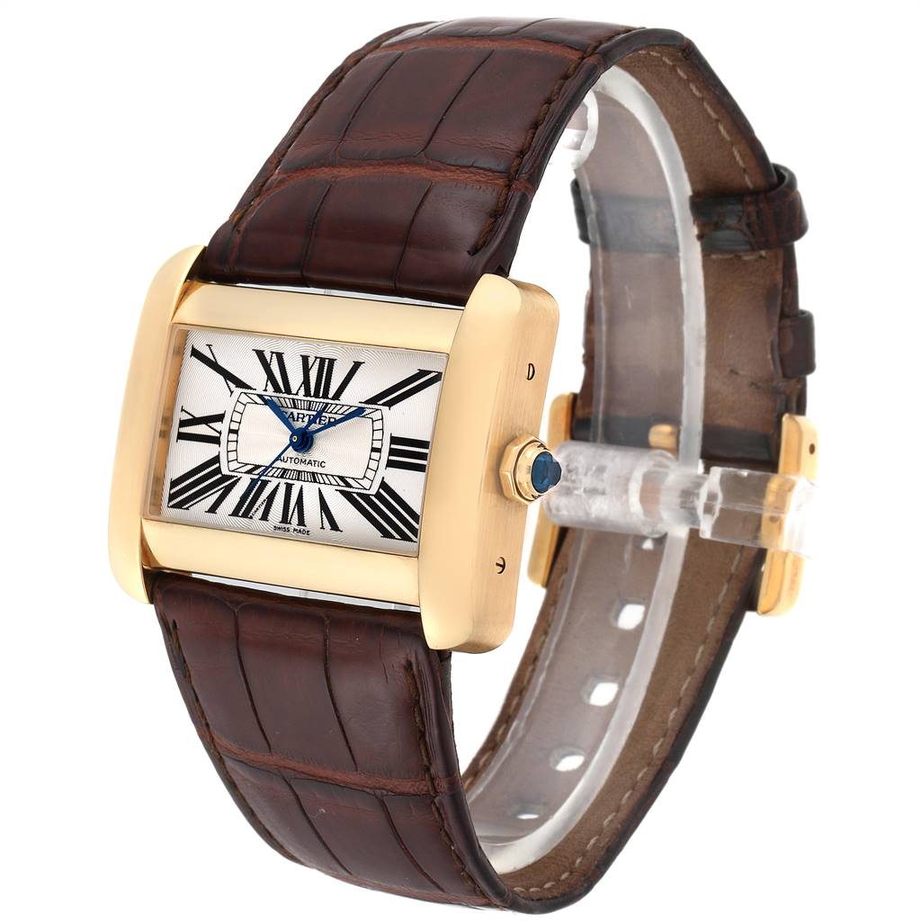 The Cartier Tank Divan W6300856‏ Women's Yellow Gold Silver Dial W6300856‏ Women's Yellow Gold Silver Dial watch is shown at an angle with a clear view of the face, case, and alligator leather strap.