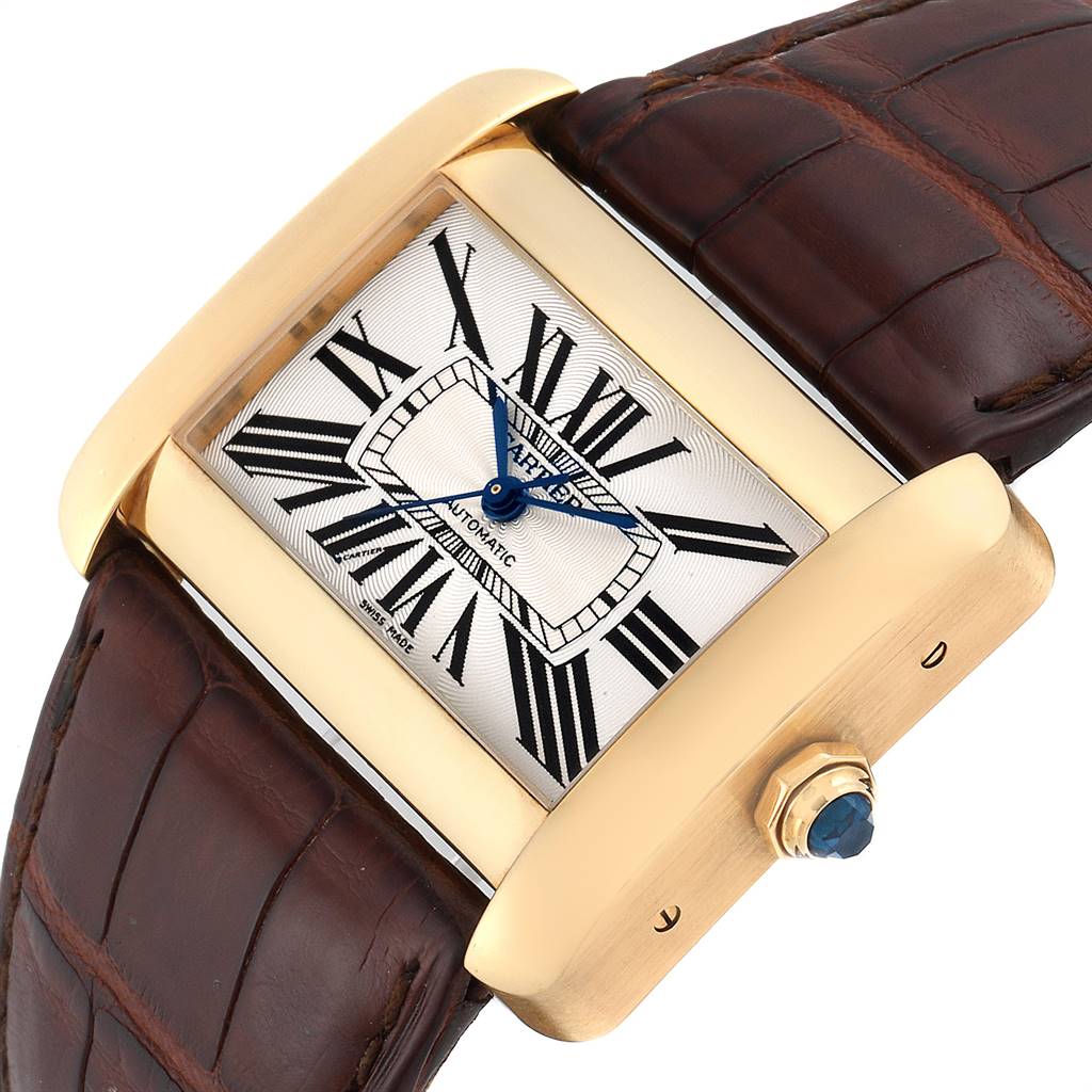 The Cartier Tank Divan W6300856‏ Women's Yellow Gold Silver Dial W6300856‏ Women's Yellow Gold Silver Dial watch is shown at an angled top view, highlighting the face, Roman numerals, crown, and brown leather strap.