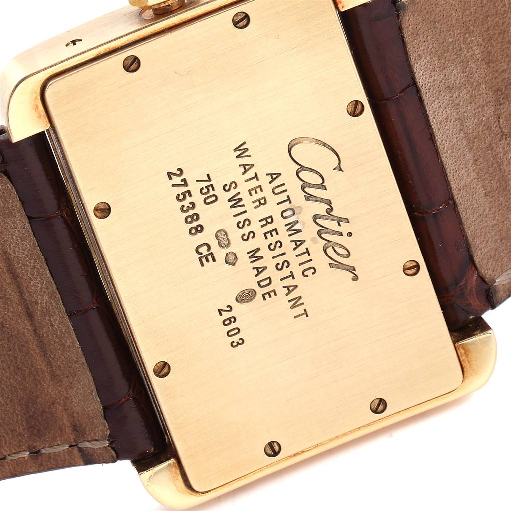 This image shows the backside of the Cartier Tank Divan W6300856‏ Women's Yellow Gold Silver Dial W6300856‏ Women's Yellow Gold Silver Dial watch, highlighting model and brand engravings.
