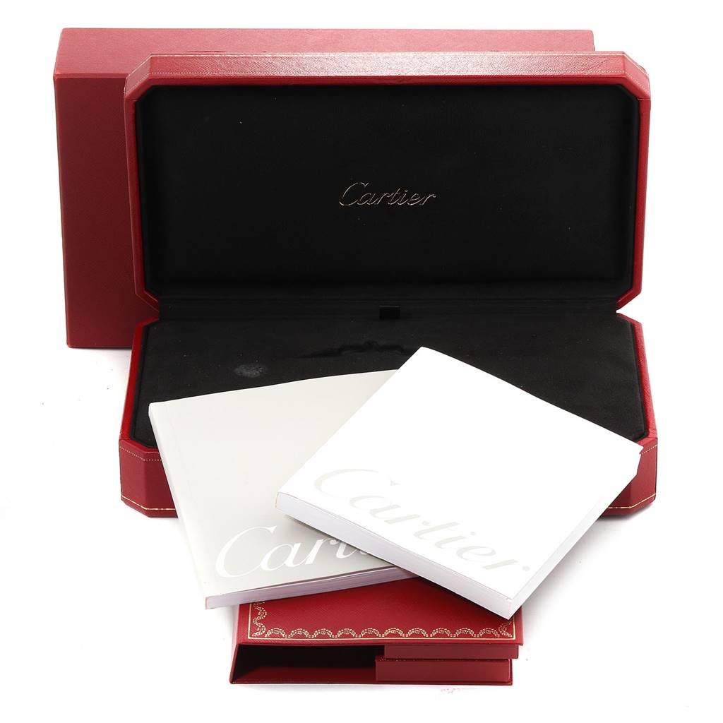 The image shows a Cartier Tank Divan W6300856‏ Women's Yellow Gold Silver Dial W6300856‏ Women's Yellow Gold Silver Dial watch box with accompanying booklets and documents.