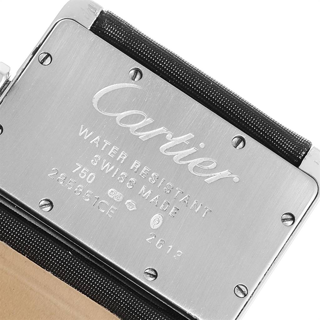 The image shows the back case of a Cartier Tank Divan WA301271 Women's White Gold Silver Dial WA301271 Women's White Gold Silver Dial watch, highlighting its markings and screws.