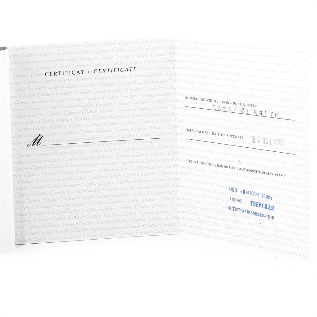 The image shows the authenticity certificate with details and stamp for the Cartier Tank Divan WA301170‏ Women's Yellow Gold Silver Dial WA301170‏ Women's Yellow Gold Silver Dial watch.