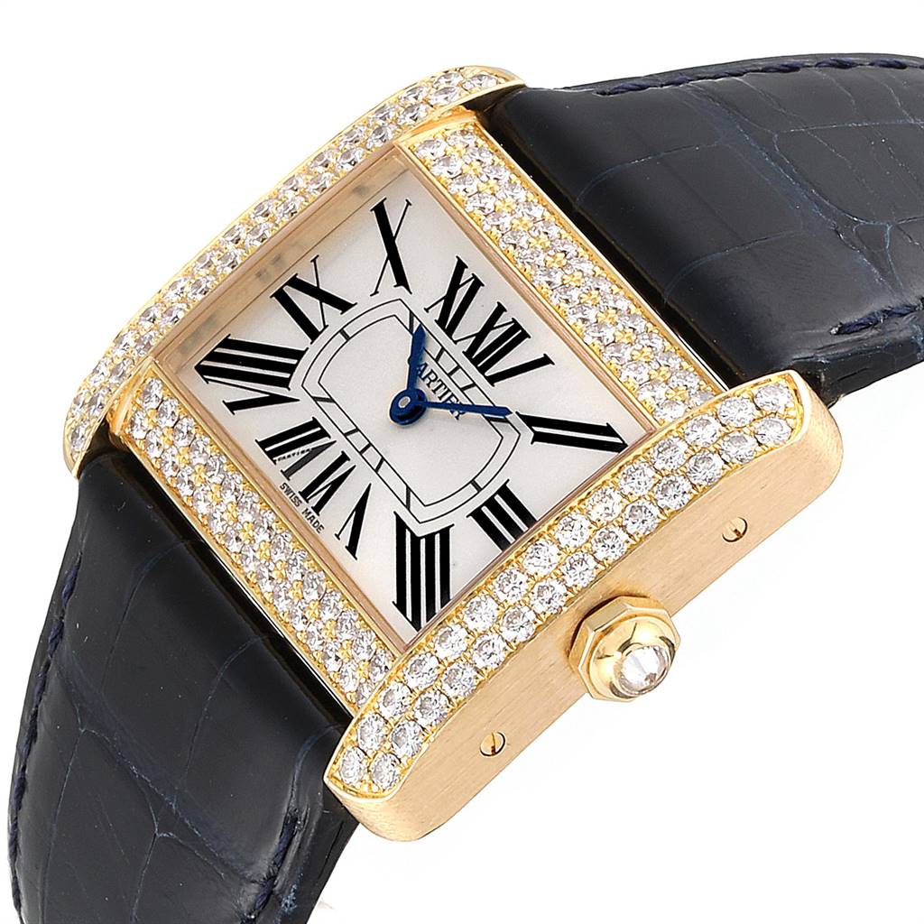 This image shows a Cartier Tank Divan WA301170‏ Women's Yellow Gold Silver Dial WA301170‏ Women's Yellow Gold Silver Dial watch at a slight angle, highlighting its square face, diamond bezel, and black leather strap.