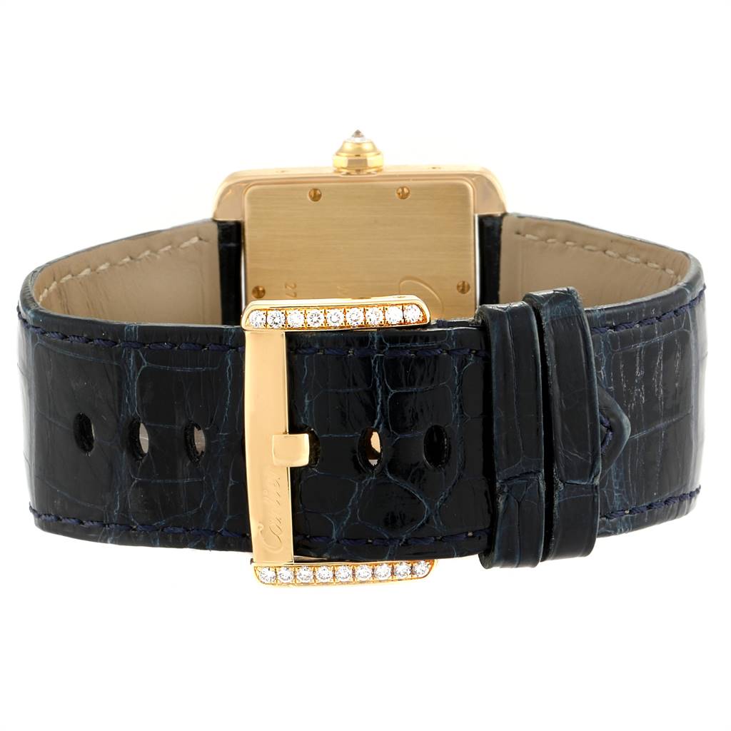 The image shows the back view of a Cartier Tank Divan WA301170‏ Women's Yellow Gold Silver Dial WA301170‏ Women's Yellow Gold Silver Dial watch, highlighting the leather strap and gold buckle.