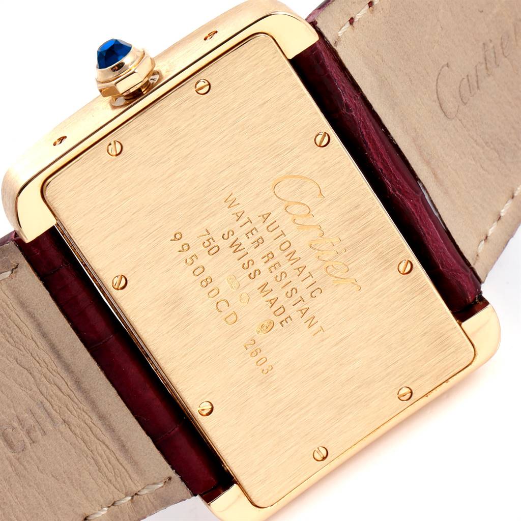 The image shows the back of a Cartier Tank Divan W6300856 Women's Yellow Gold Silver Dial W6300856 Women's Yellow Gold Silver Dial watch, highlighting text details and the strap attachment.