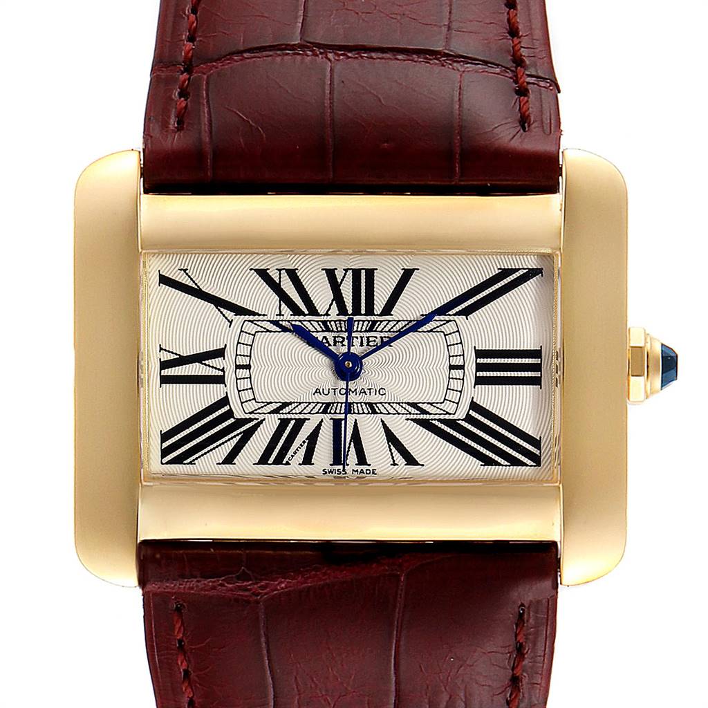 The image shows a frontal view of a Cartier Tank Divan W6300856 Women's Yellow Gold Silver Dial W6300856 Women's Yellow Gold Silver Dial watch, highlighting its rectangular face, Roman numerals, and leather strap.