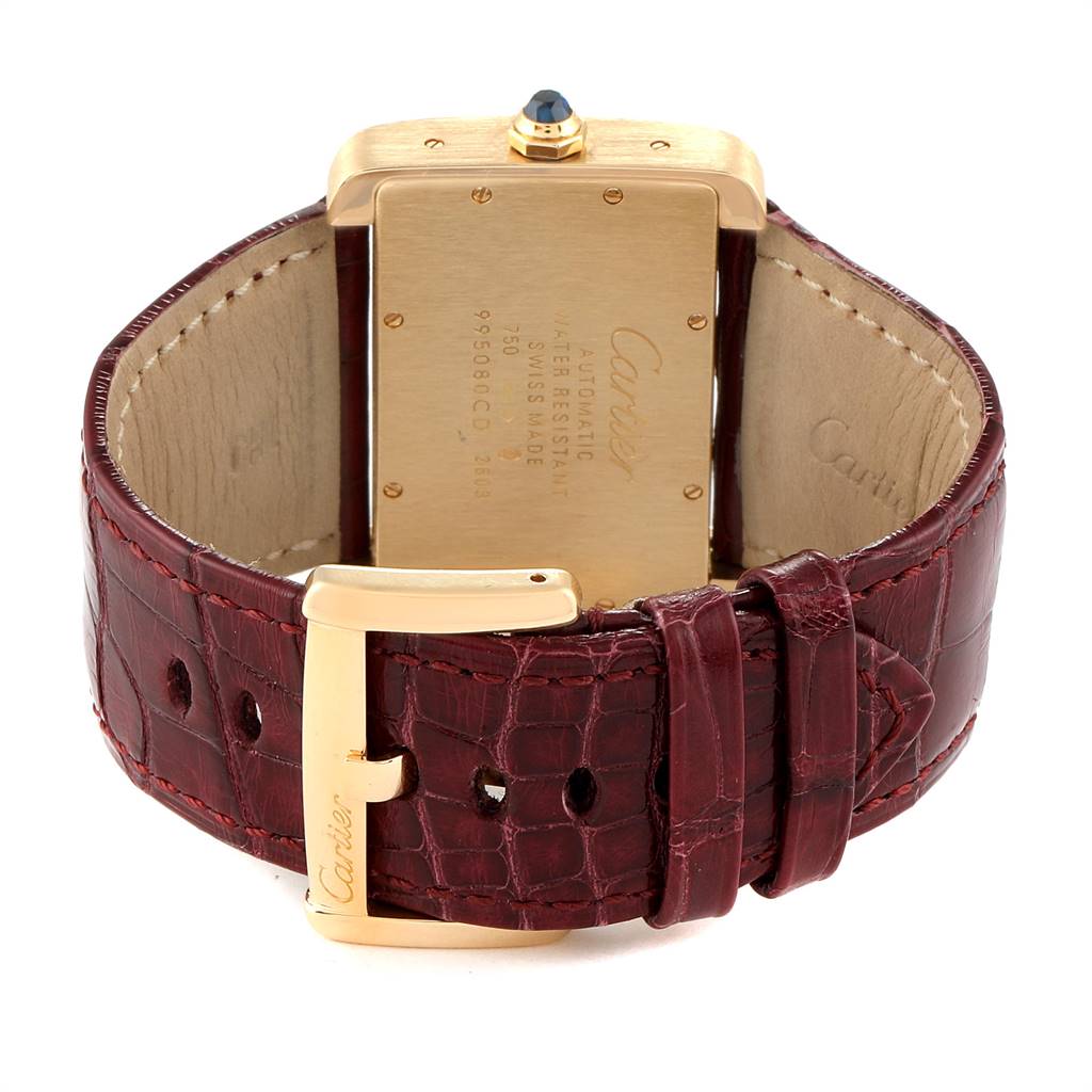 This image shows the back of a Cartier Tank Divan W6300856 Women's Yellow Gold Silver Dial W6300856 Women's Yellow Gold Silver Dial watch, displaying the case back and leather strap with a buckle.