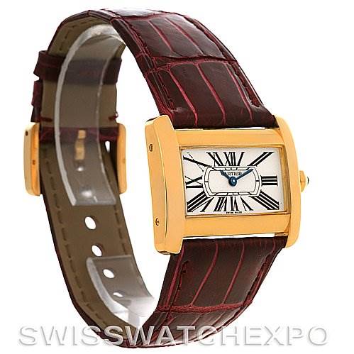 This image shows a Cartier Tank Divan W6300356 Women's Yellow Gold White Dial W6300356 Women's Yellow Gold White Dial watch at a three-quarter angle, highlighting its face, bezel, and leather strap.