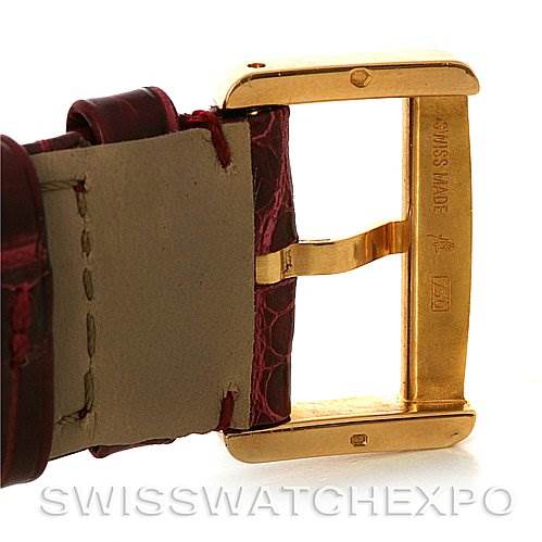 The image shows a close-up of the clasp and part of the leather strap of a Cartier Tank Divan W6300356 Women's Yellow Gold White Dial W6300356 Women's Yellow Gold White Dial watch.