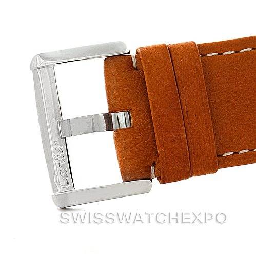 The image shows a close-up of the buckle and leather strap of a Tank Divan model by Cartier.