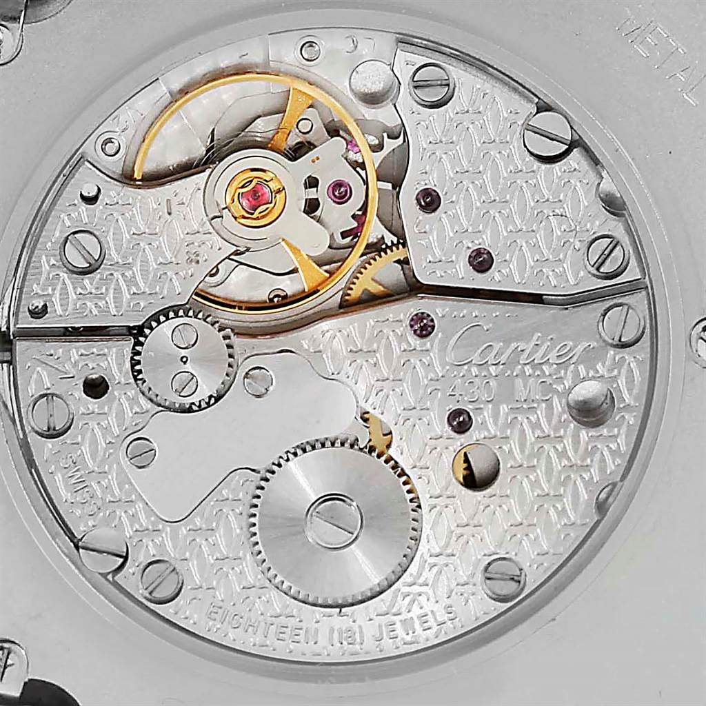 The image shows a close-up view of the movement mechanism inside a Cartier Santos Dumont W2007051 Men's White Gold Silver Dial W2007051 Men's White Gold Silver Dial watch.