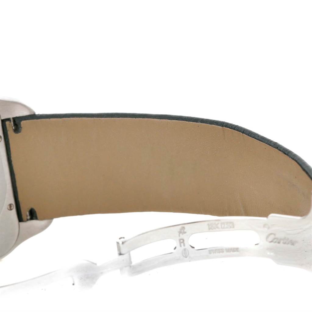 This image shows a side angle of the band and clasp of the Cartier Santos Dumont W2007051 Men's White Gold Silver Dial W2007051 Men's White Gold Silver Dial watch, highlighting the leather strap and metal clasp.