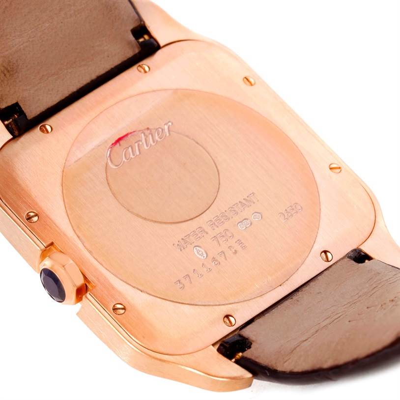 The image shows the back case and leather strap attachment of a Cartier Santos Dumont W2006951 Men
s Rose Gold Silver Dial W2006951 Men
s Rose Gold Silver Dial watch.