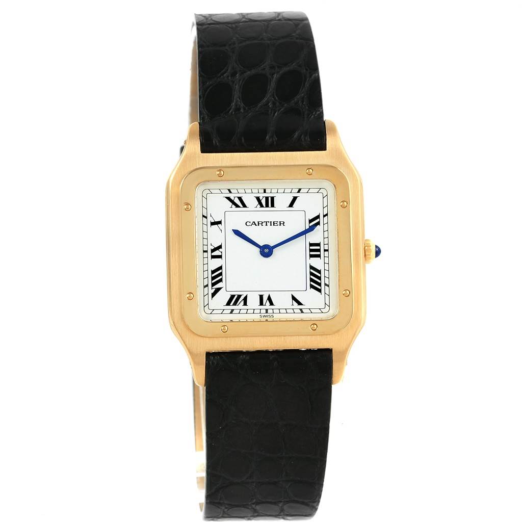 The image shows a Cartier Santos Dumont 15751 Men's Yellow Gold White Dial 15751 Men's Yellow Gold White Dial watch from a front angle, featuring its square gold case and black leather strap.