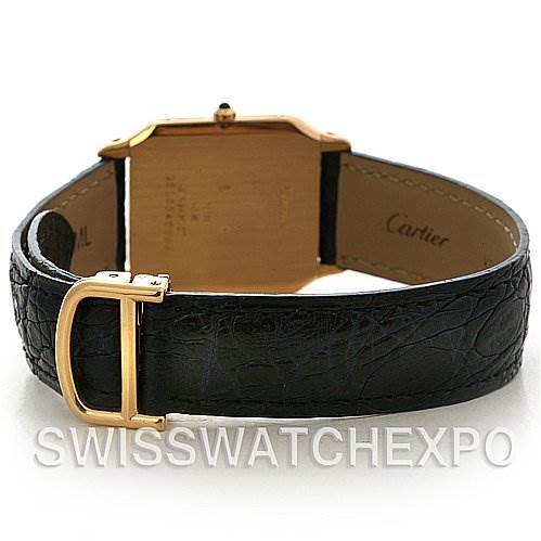 This image shows the back and strap of a Santos Dumont watch by Cartier at a rear angle.
