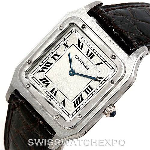 The image shows a close-up angled view of the Cartier Santos Dumont 15751 Platinum White Dial 15751 Platinum White Dial watch, highlighting the face, black leather strap, and metal casing.