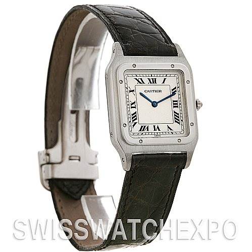 The image shows a Santos Dumont watch by Cartier, angled to display the face, bezel, and part of the leather strap.