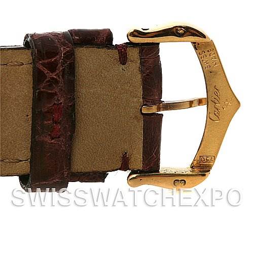 This image shows the buckle and part of the leather strap of the Santos Dumont model by Cartier.
