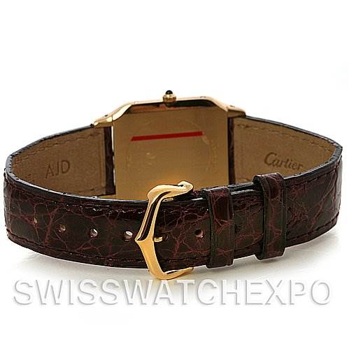 The image shows the rear view of a Santos Dumont model by Cartier, highlighting the leather strap and buckle.