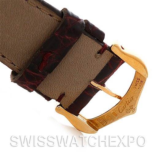 This image shows a close-up of the buckle and strap of a Santos Dumont model by Cartier.