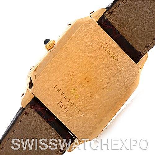 The image shows the backside of a Santos Dumont model by Cartier, including the case back and part of the strap.
