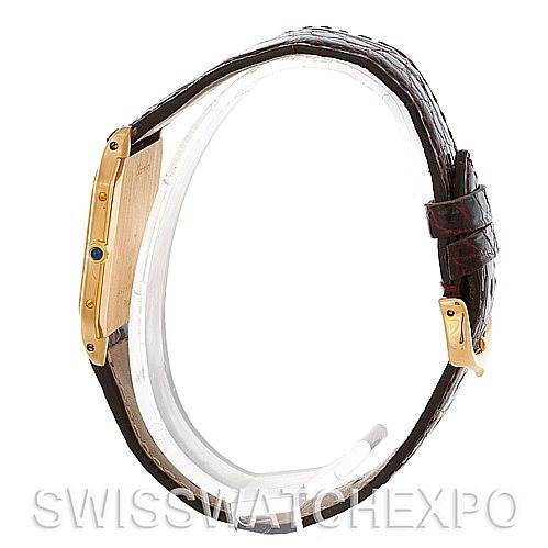 This image shows a side view of the Cartier Santos Dumont Men's Yellow Gold White Dial Men's Yellow Gold White Dial watch, highlighting its case thickness and brown leather strap.